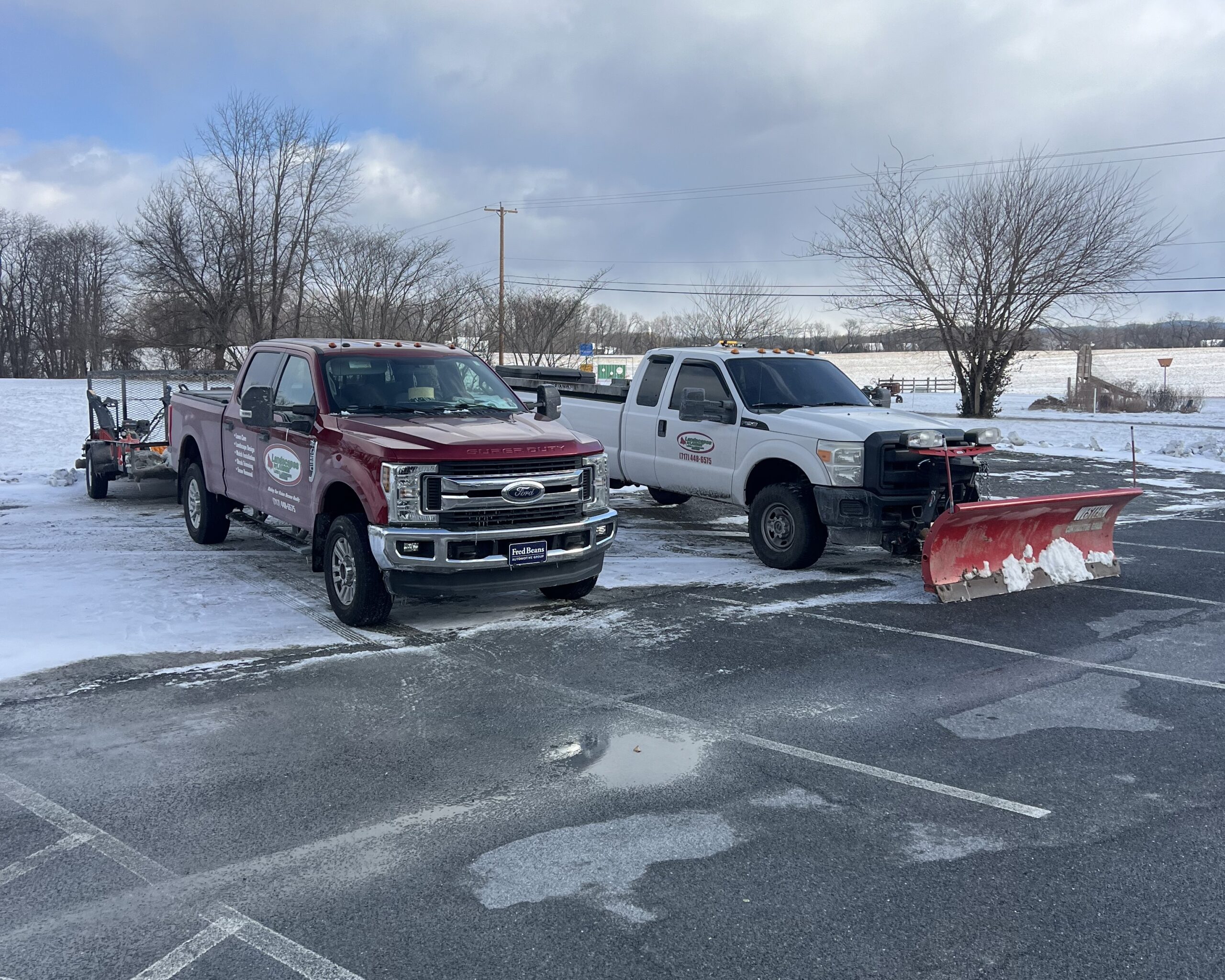 Landscapes by Landon plow trucks staged for snow removal service near Mechanicsburg PA